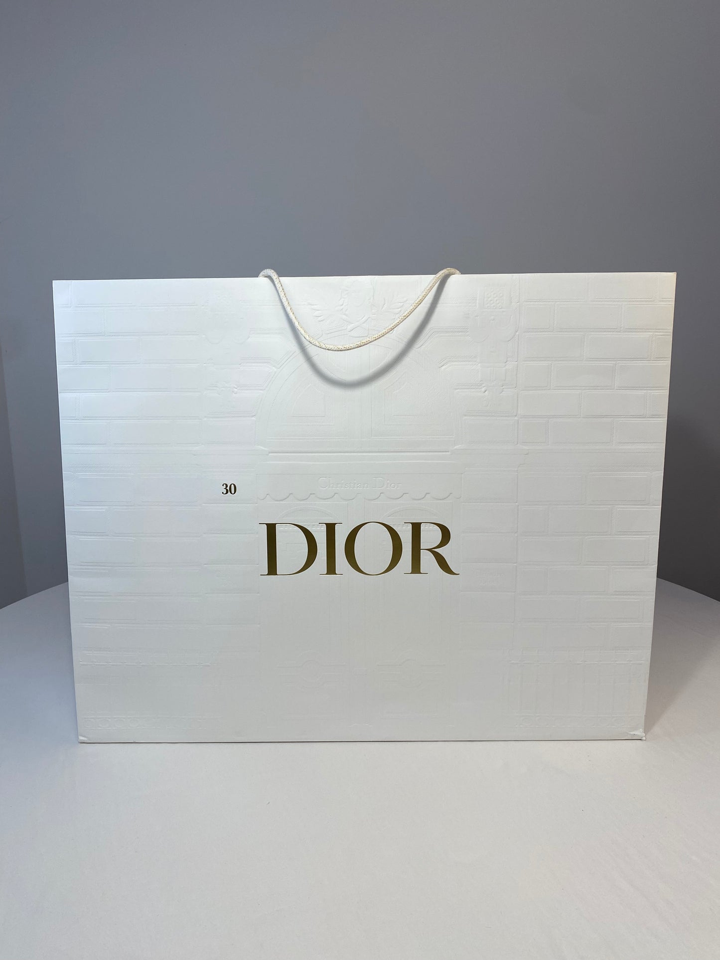 Sac shopping Dior blanc avec relief, différentes tailles