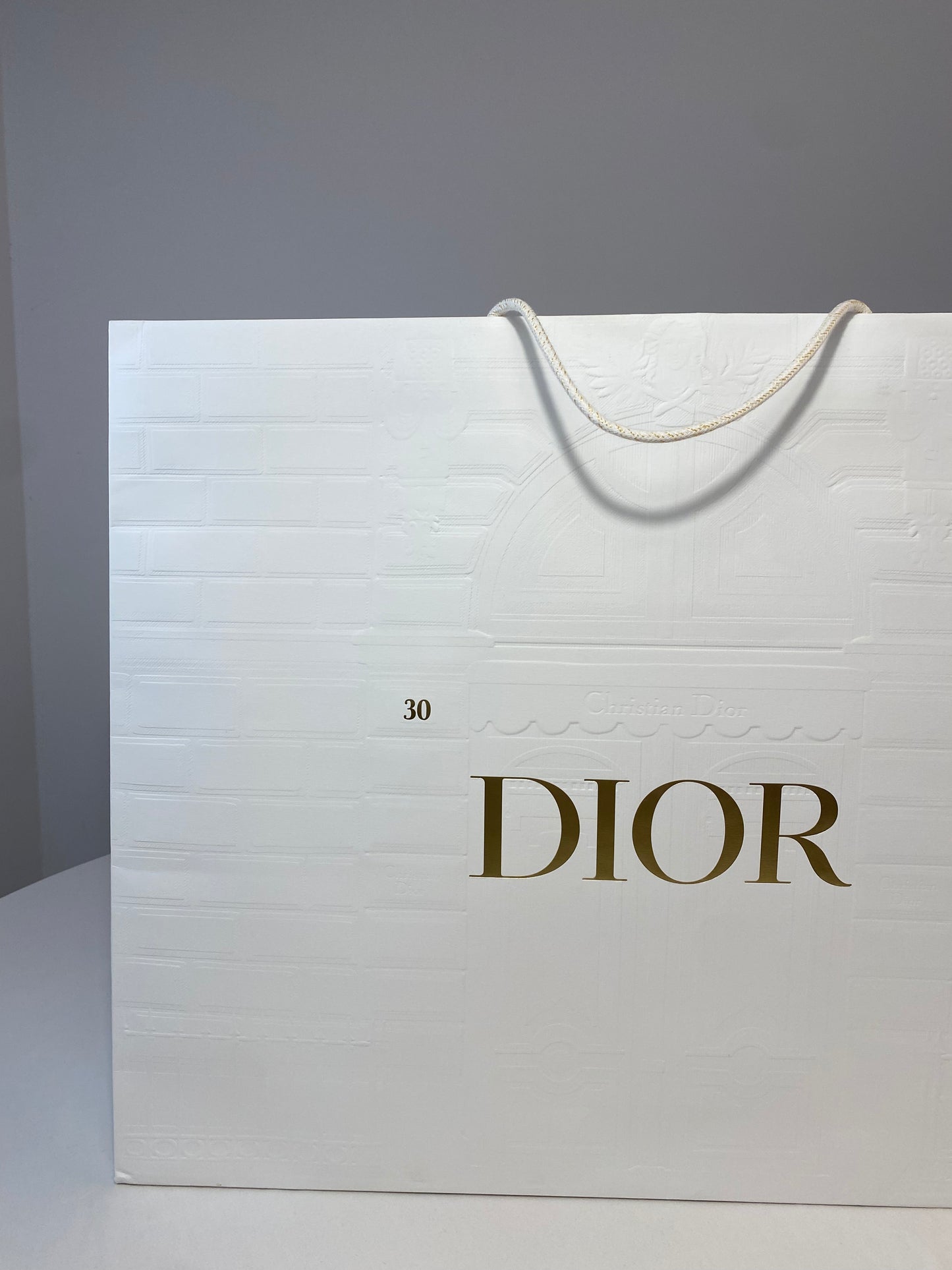 Sac shopping Dior blanc avec relief, différentes tailles