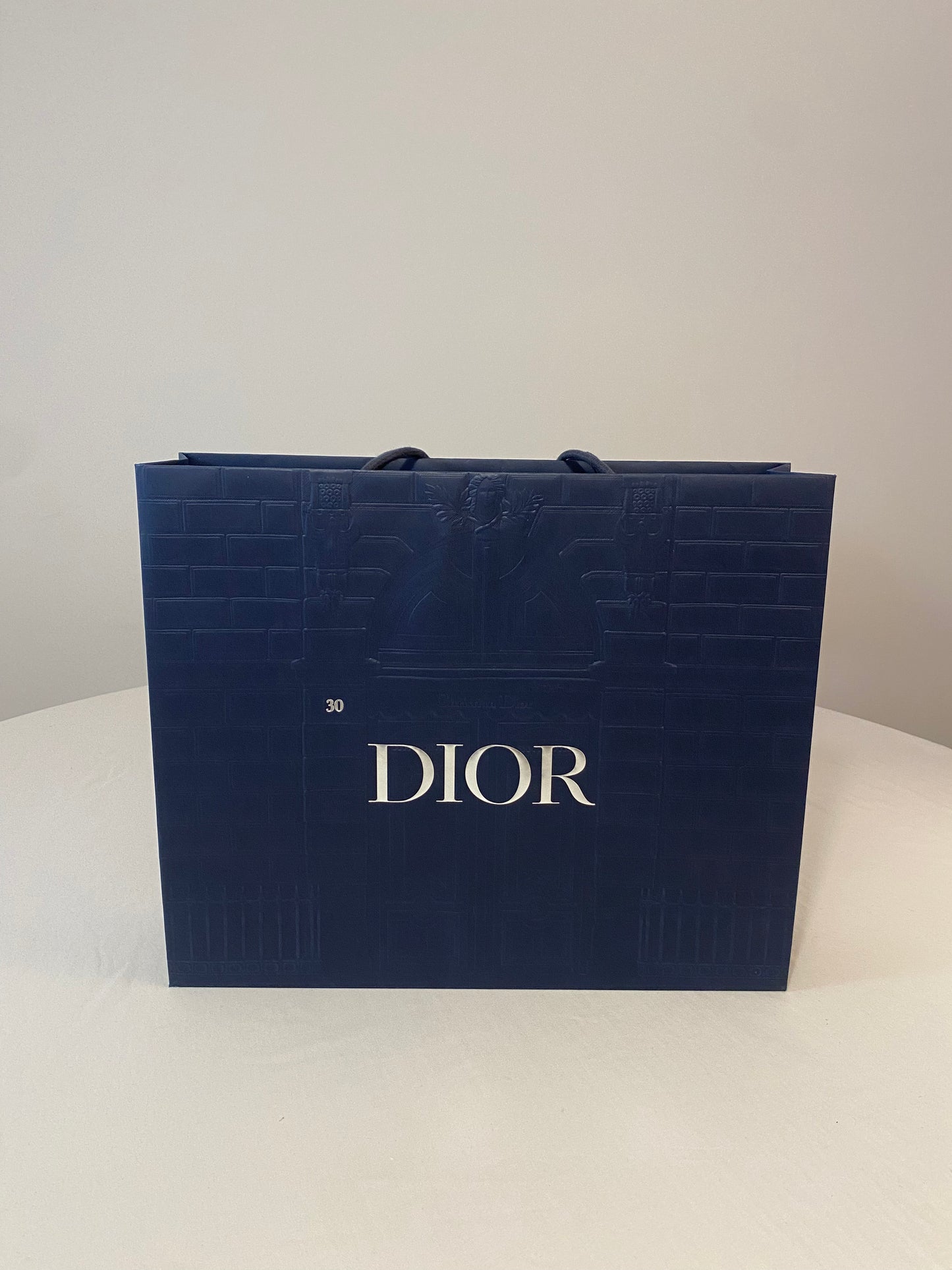 Sac shopping Dior bleu avec relief, différentes tailles