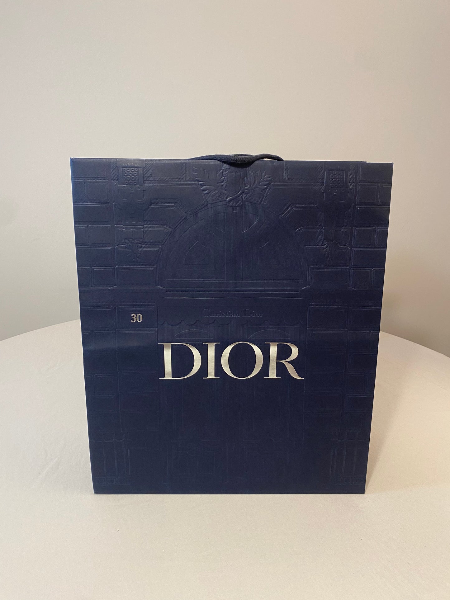 Sac shopping Dior bleu avec relief, différentes tailles